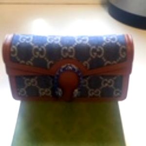 Gucci mini bag new in box all paper work included